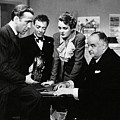 PETER LORRE , HUMPHREY BOGART , MARY ASTOR and SYDNEY GREENSTREET in THE MALTESE FALCON -1941-.